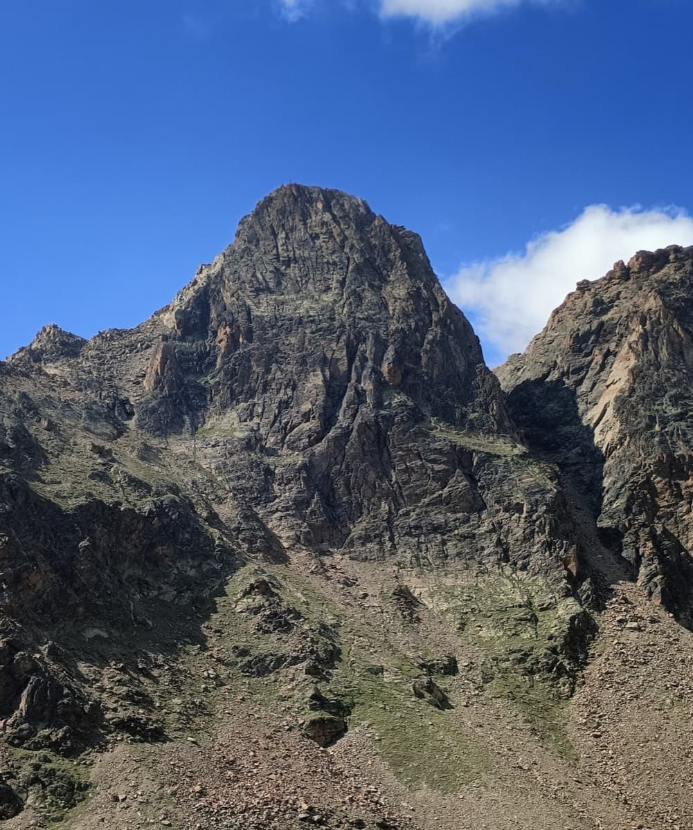 The Jegihorn south face from the approach; Panorama is the right-hand route on the face