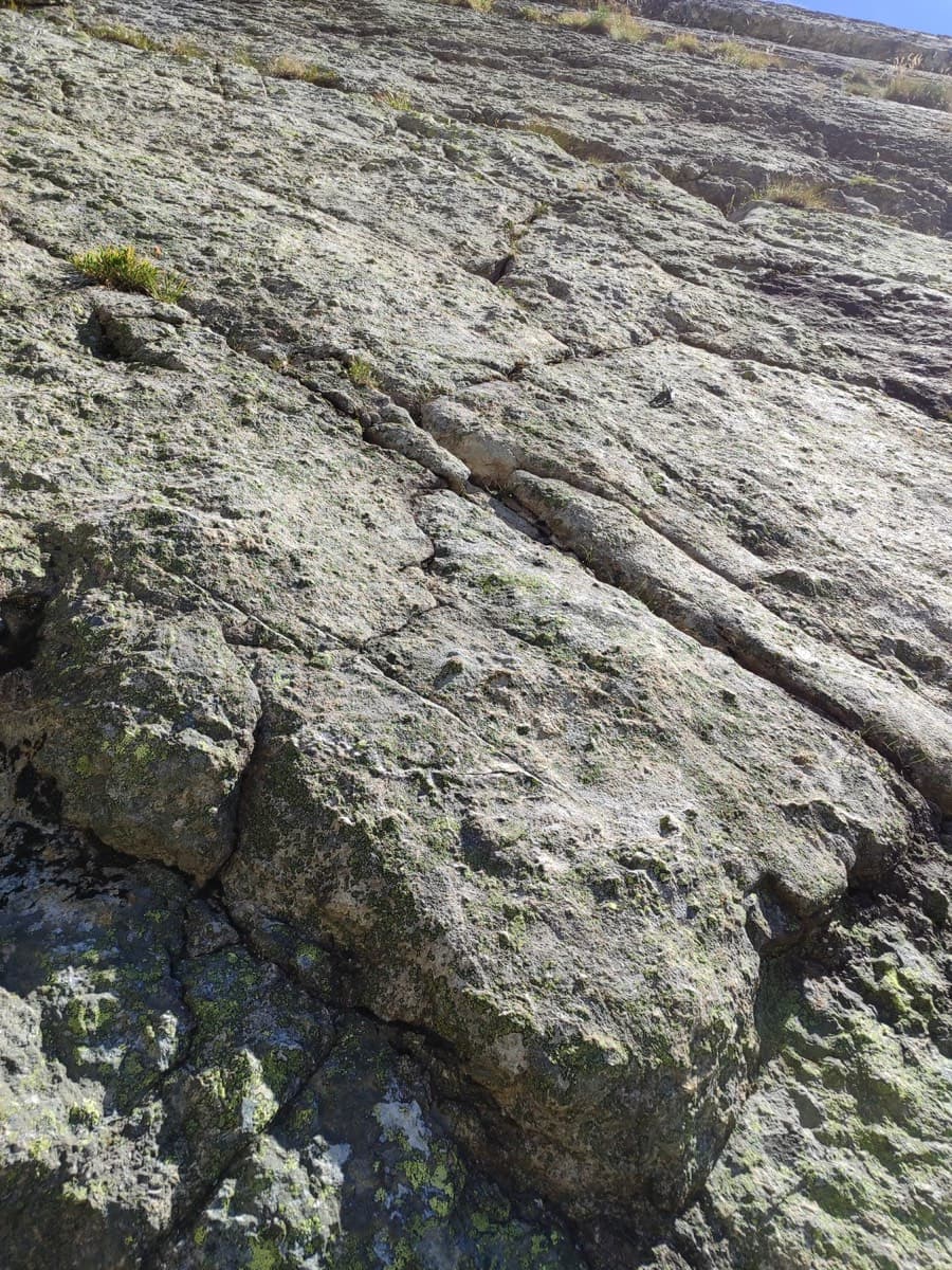 The sculpted slab at the start of Barabba (August 2025). There is no name at the base.