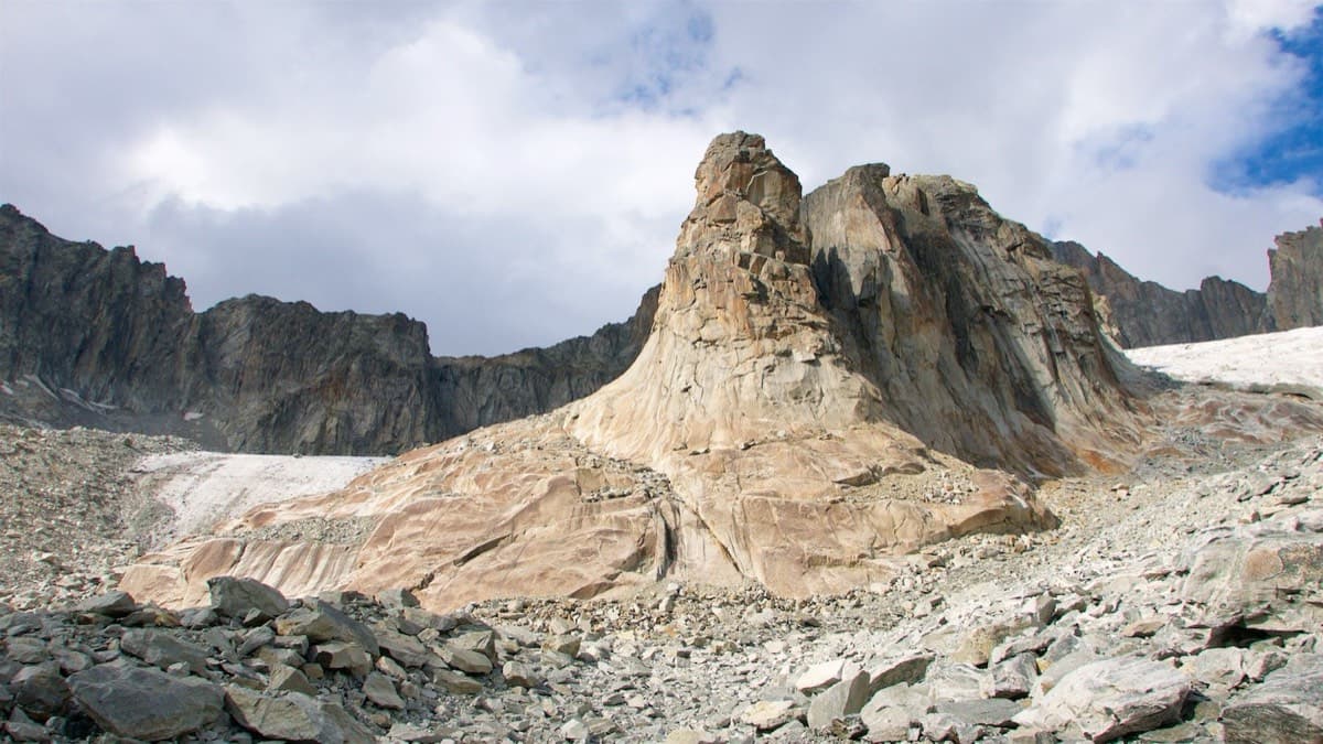 The Hannibalturm seen across the moraine, with the edge of the Sidelen glacier behind it.