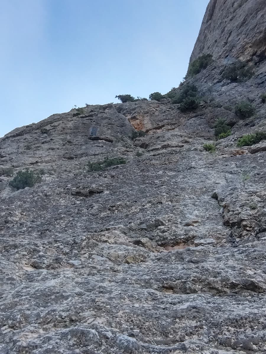 Looking up the slab at the start of the route (photo titled 'depart' by a 2026 party).