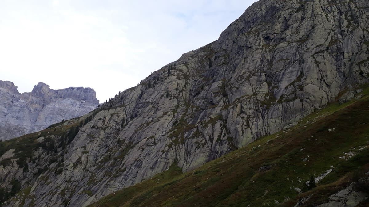 The Platten slabs above the Susten pass road, seen from the approach path.