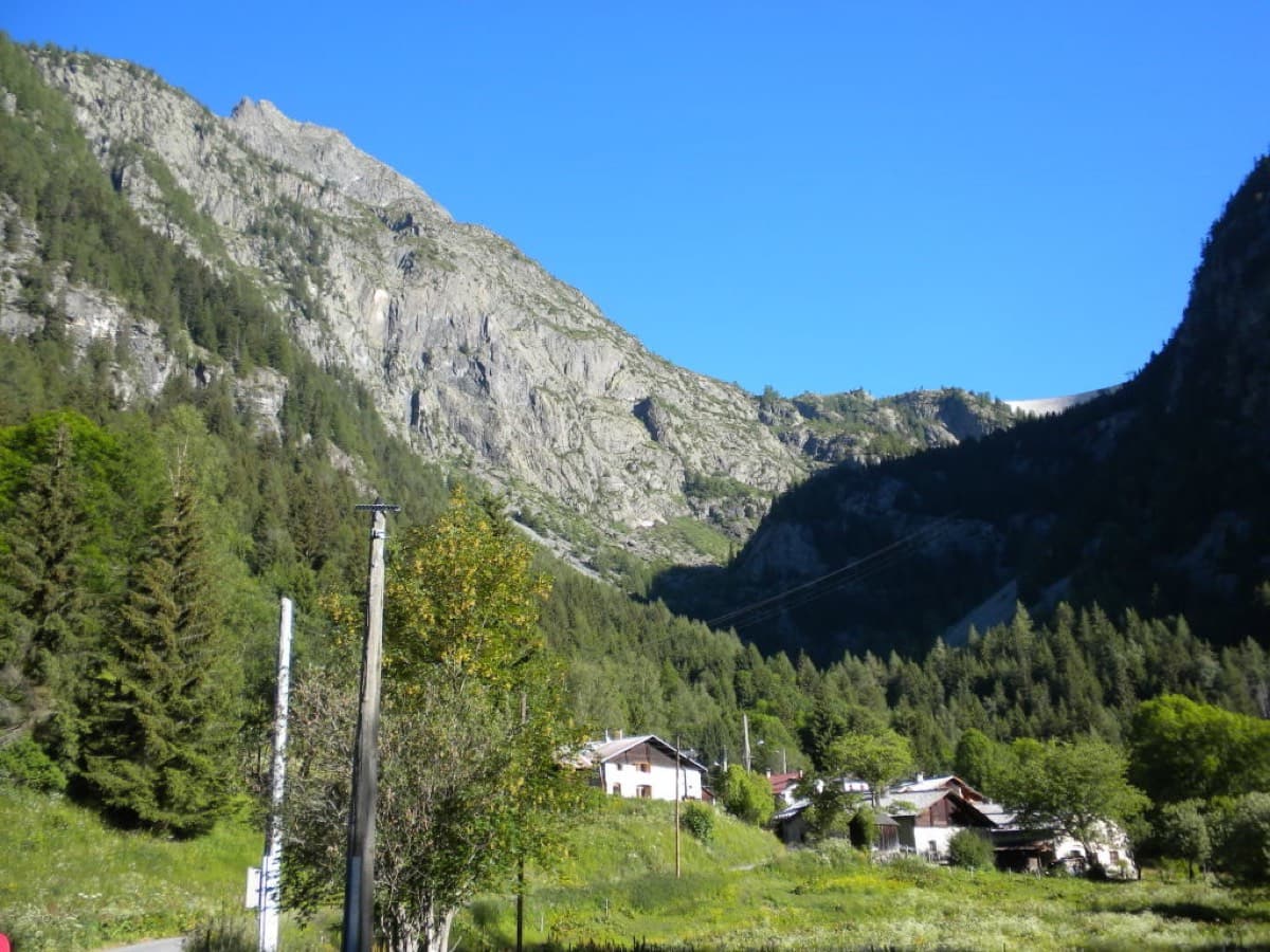 The hamlet of Barberine, where the walk starts, with rock slabs on the hillside to the left.