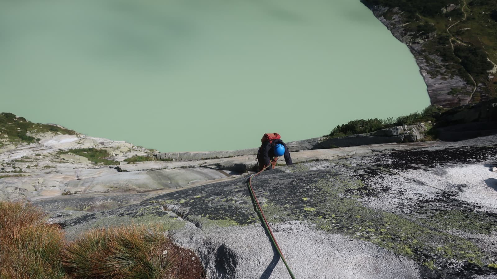 Arriving at a belay on Grimselstrom high above the Räterichsbodensee.