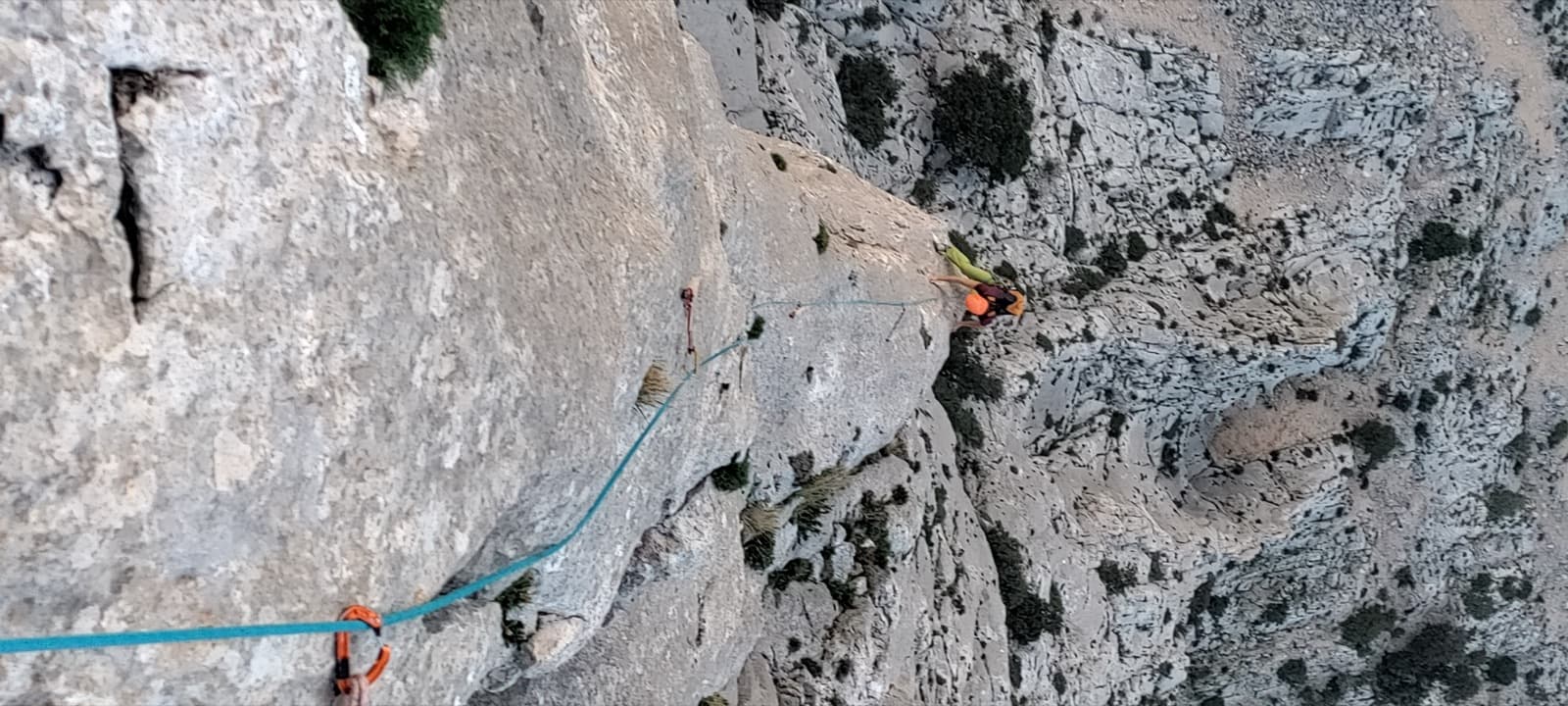 The exposed final pitch of L'Ombra della Mia Mano on the pillar of Punta Cusidore.
