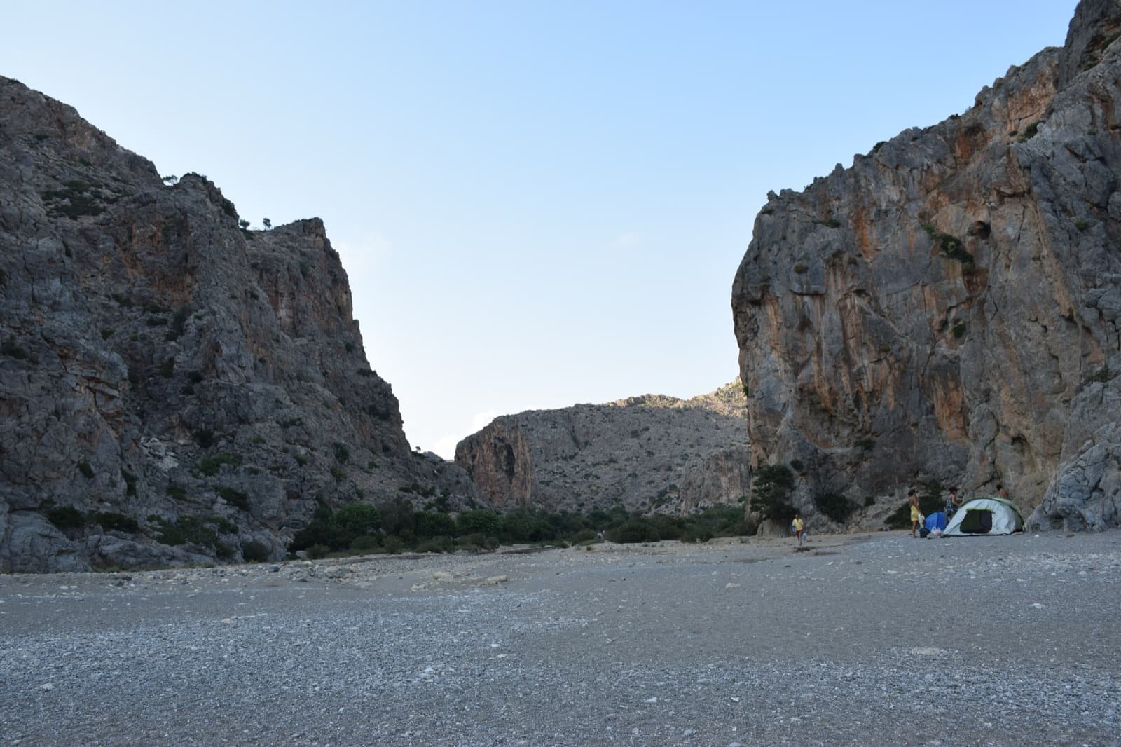 The limestone walls at the seaward mouth of the Agiofarago gorge, seen from the beach.