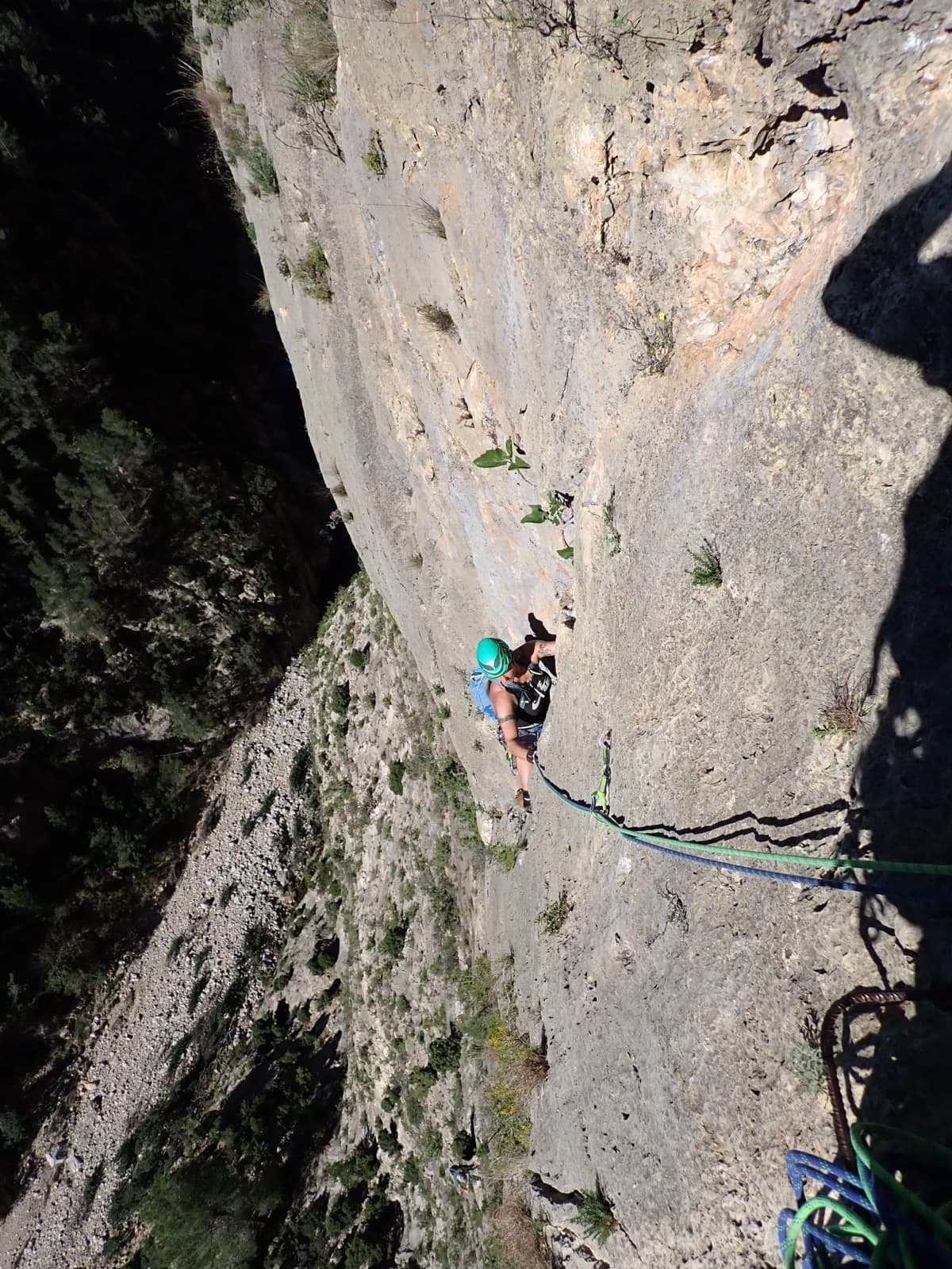 A climber on the grey limestone of Monsieur, Los Calpes.