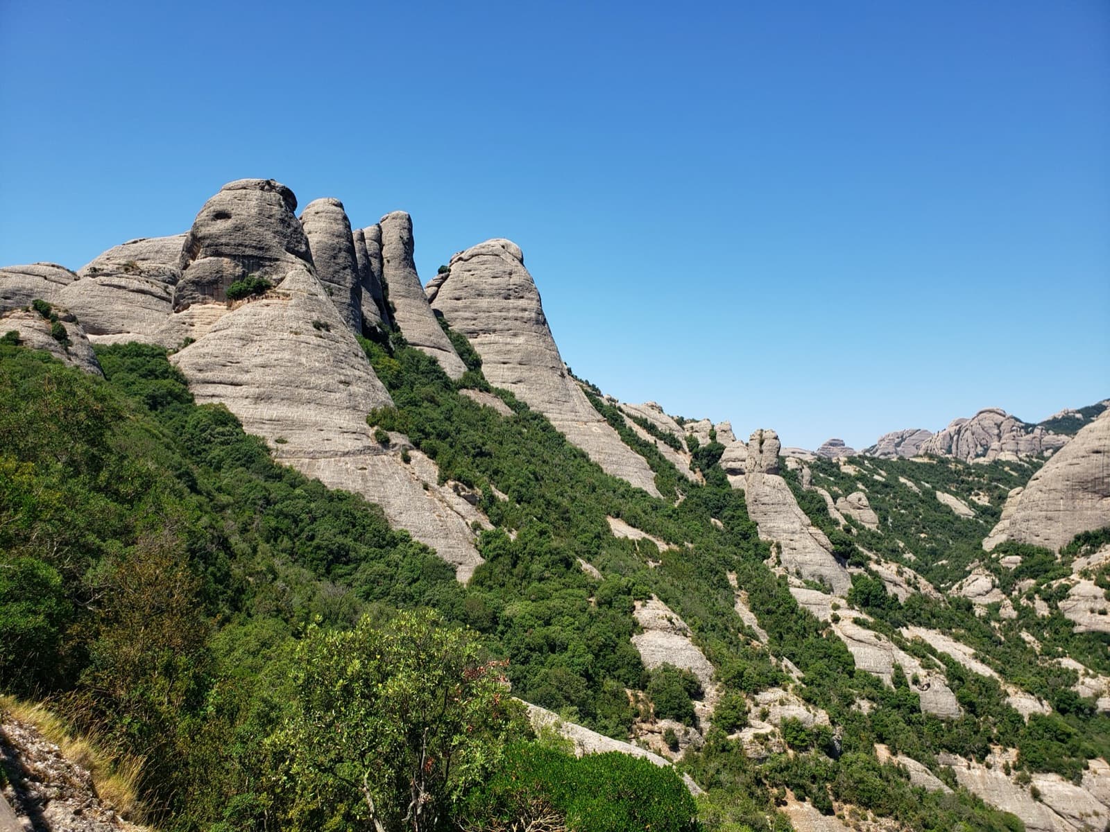 The Gorros from the approach path; the Gorra Marinera is the left-hand tower.