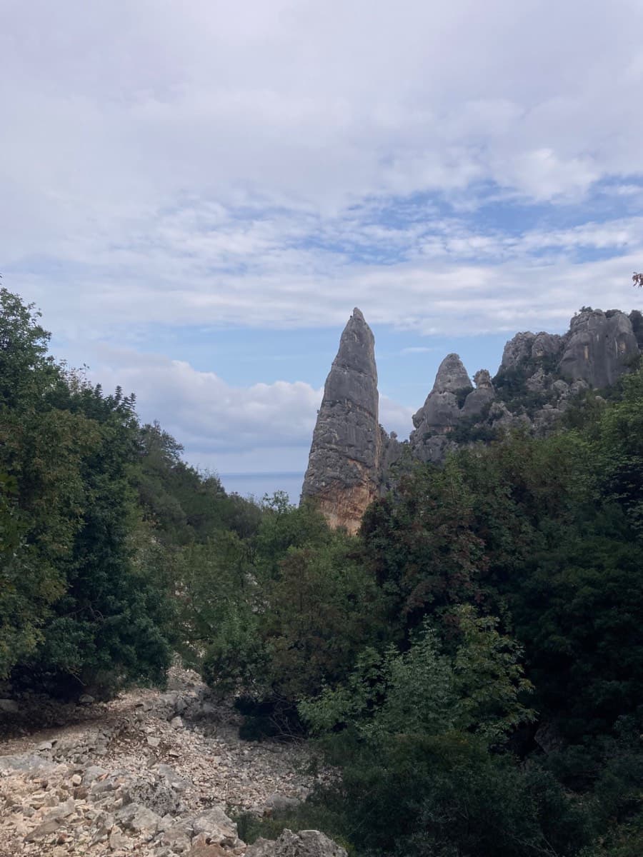 The Aguglia di Goloritzè seen from the approach path down the valley