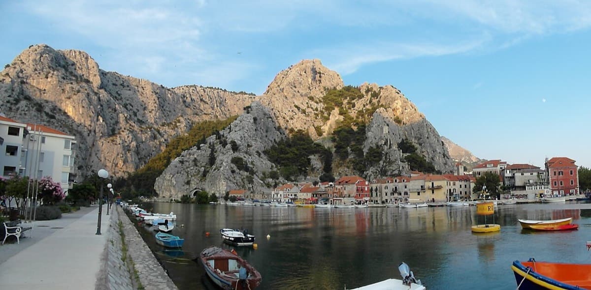 Omiš old town and harbour beneath the limestone cliffs at the mouth of the Cetina