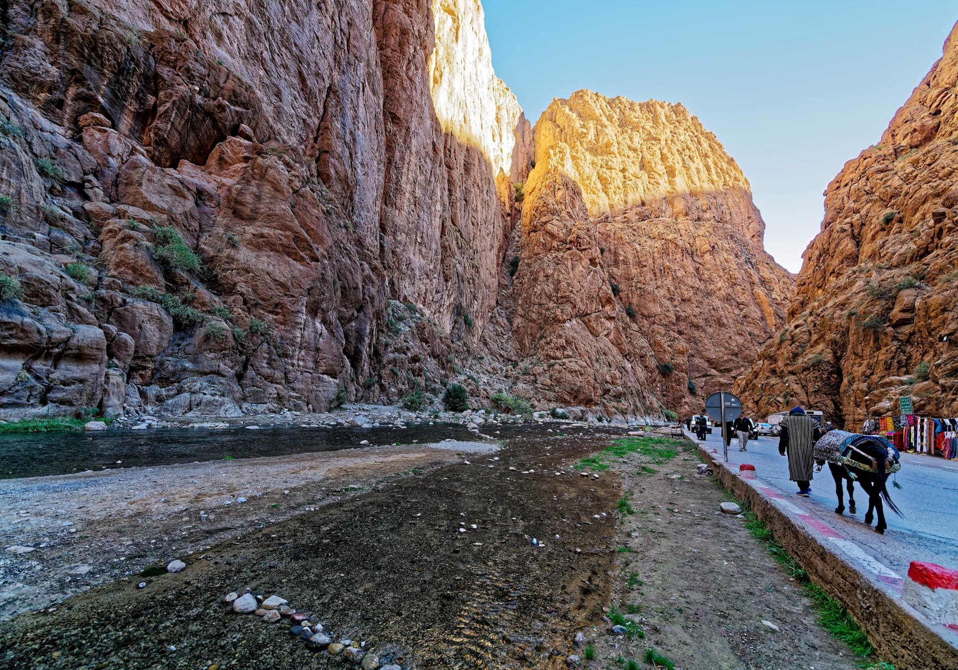 The narrows of the Todra Gorge in late afternoon light, a few minutes' walk upstream of the Mansour wall; a view of the gorge, not of this route's wall.