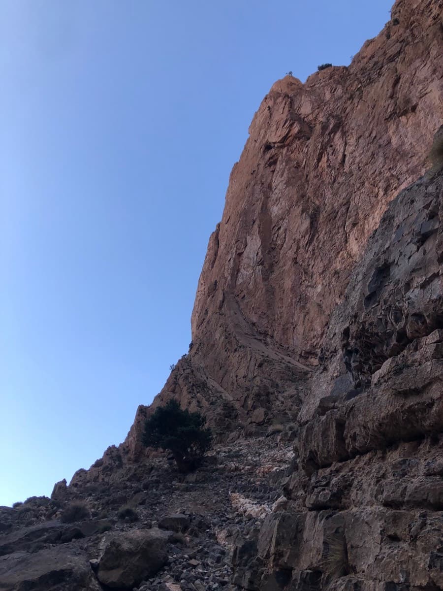 The west face of the Taoujdad from the approach, with the access ramps at its foot